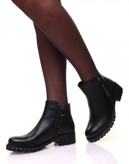 Ankle boots with decorative zippers and studded soles