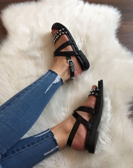 Bare black studded strappy feet
