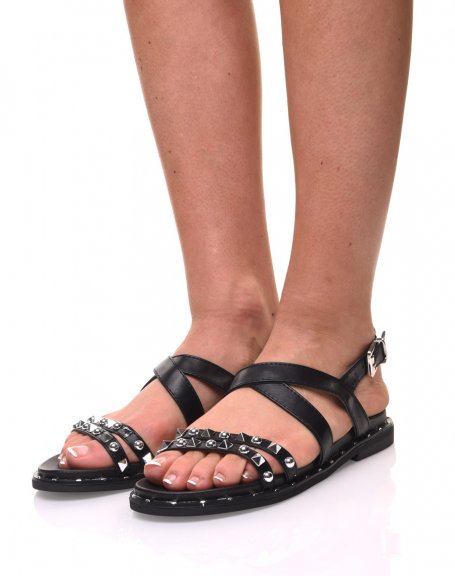 Bare black studded strappy feet