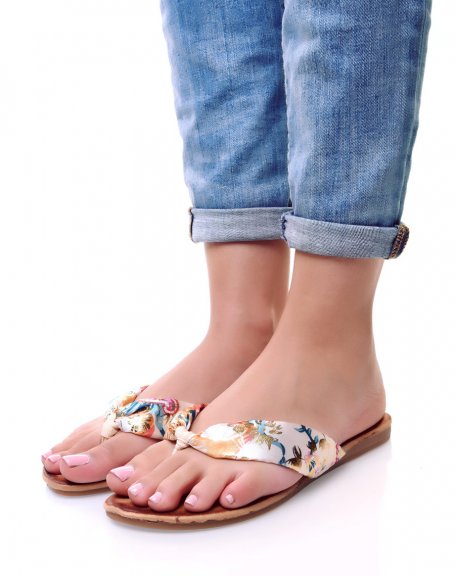 Barefoot with large floral thong