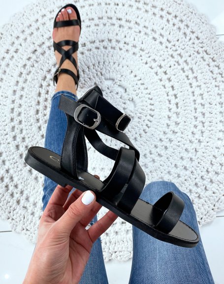 Barefoot with multiple straps in black faux leather