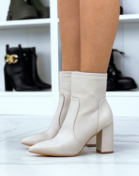 Beige ankle boots with heel and pointed toe