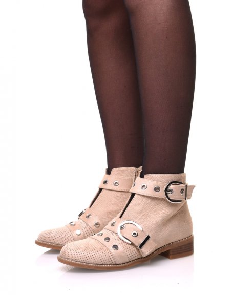 Beige ankle boots with studded straps open at the front