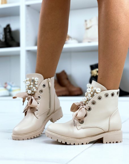 Beige ankle boots with thick laces and openwork pearls