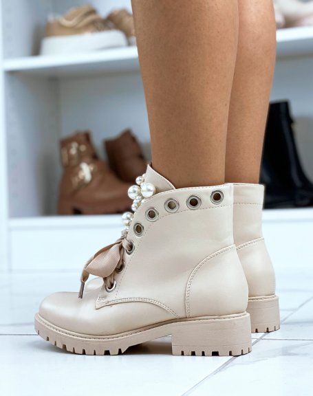Beige ankle boots with thick laces and openwork pearls