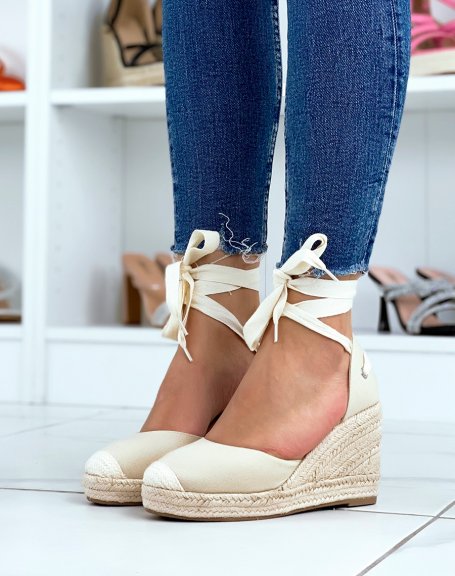 Beige canvas wedge espadrilles with ribbons