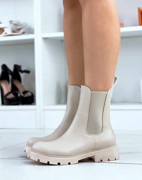 Beige chelsea boots with notched sole
