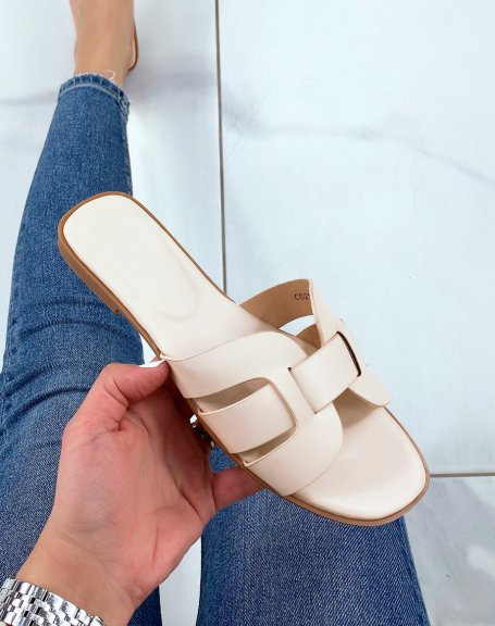 Beige flat mules with cross front straps
