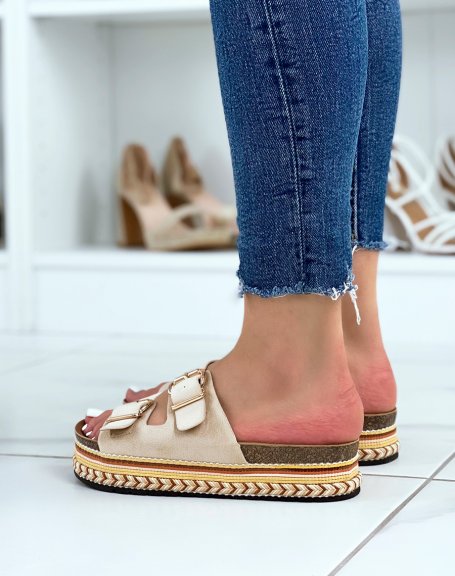 Beige flat mules with double strap and Aztec sole
