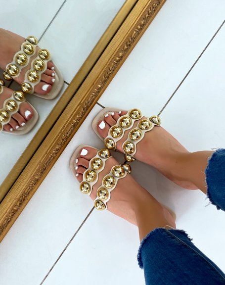 Beige flat mules with double straps and golden pearls