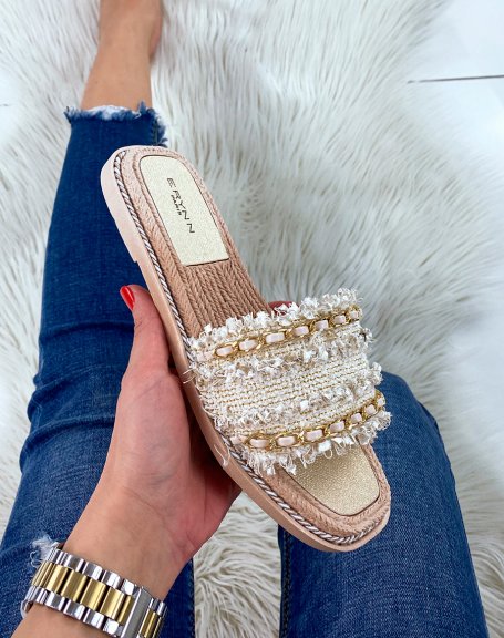 Beige flat mules with multiple details and thin golden chain