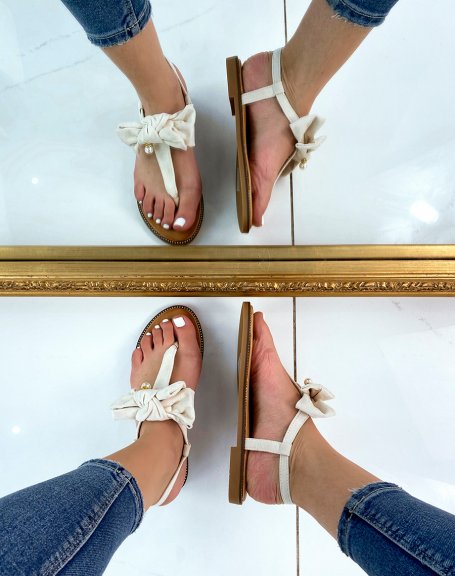 Beige flat sandals with bow and small pearl