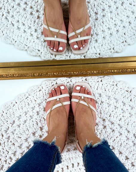 Beige flat sandals with chains