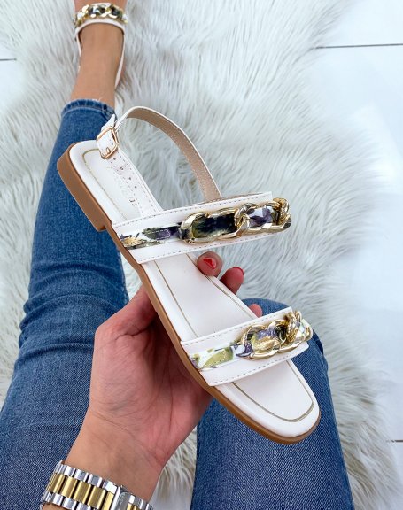 Beige flat sandals with golden and floral details