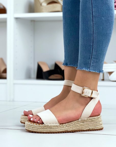 Beige flat sandals with hessian sole