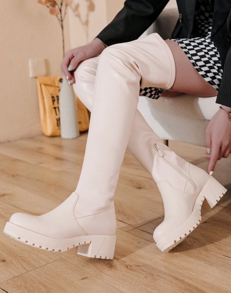 Beige flat thigh-high boots with notched platform