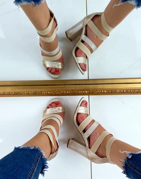 Beige heeled sandals with elastic straps and python effect