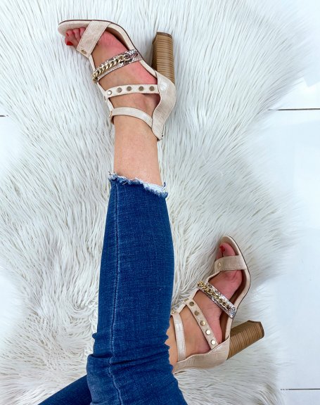 Beige heeled sandals with multiple straps with gold and animal details