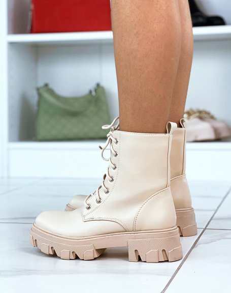 Beige lace-up ankle boots with notched sole