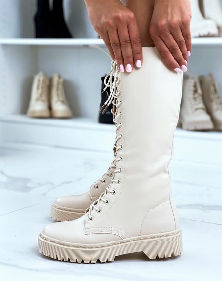 Beige lace-up boots with flat lug sole