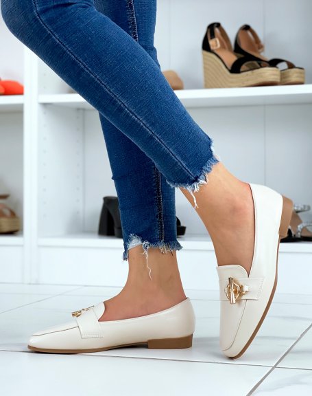 Beige loafers with golden buckle
