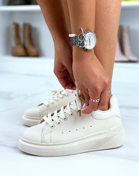 Beige low top sneakers with chunky sole