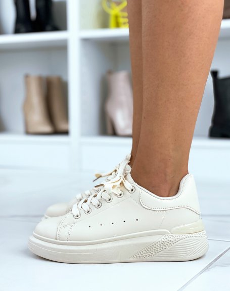 Beige low top sneakers with chunky sole