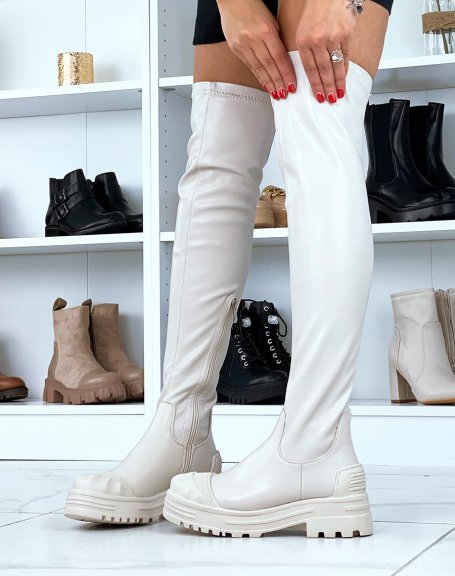 Beige over-the-knee boots with inserts and heeled sole