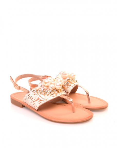 Beige sandals adorned with pearl lace and rhinestones