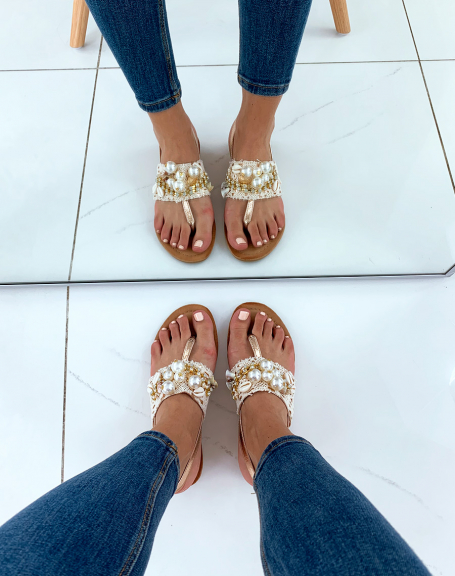 Beige sandals adorned with pearl lace and rhinestones