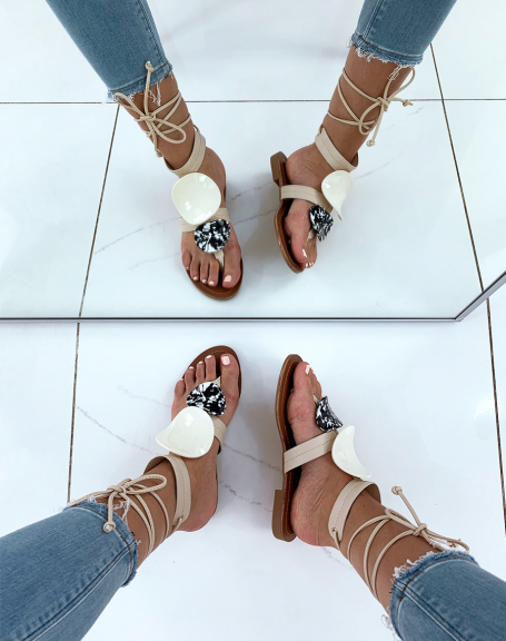 Beige sandals adorned with two patterned inserts