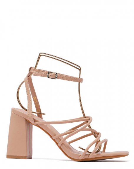 Beige sandals with criss-cross straps and thick heel