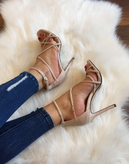 Beige sandals with crossed straps and stiletto heels