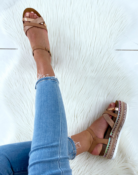 Beige sandals with fancy wedge soles and multiple straps
