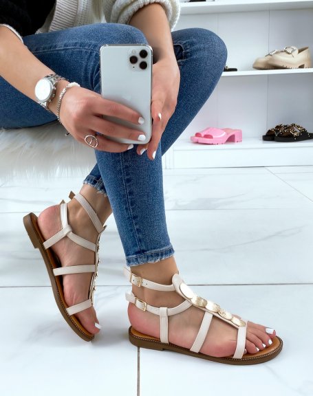 Beige sandals with gold pieces and multiple straps