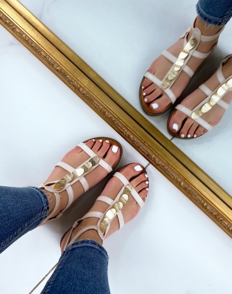 Beige sandals with gold pieces and multiple straps