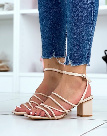 Beige sandals with heel and multiple straps