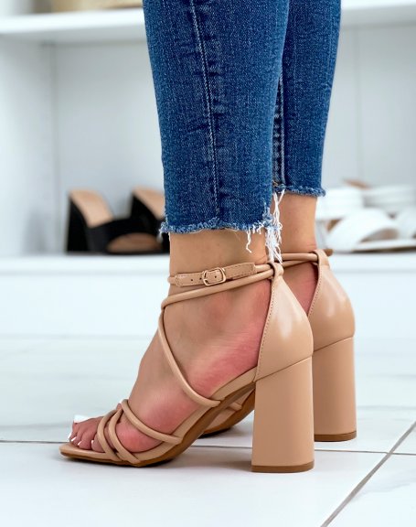 Beige sandals with intersecting straps and rounded heel