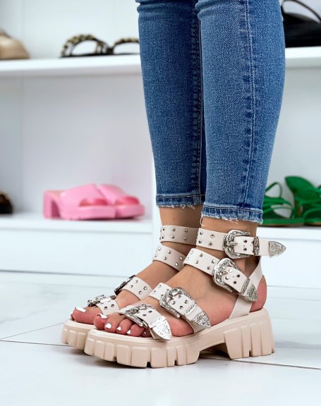 Beige sandals with small heel and multiple straps and silver details