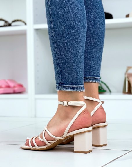 Beige sandals with square heel and multiple thin straps