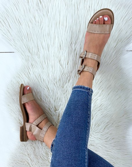 Beige sandals with studded details
