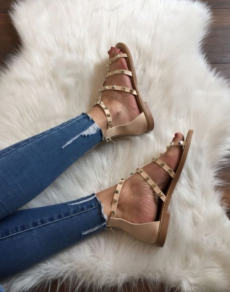 Beige sandals with studded straps