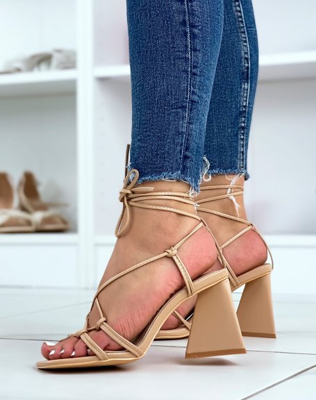 Beige sandals with thick heel and multiple straps