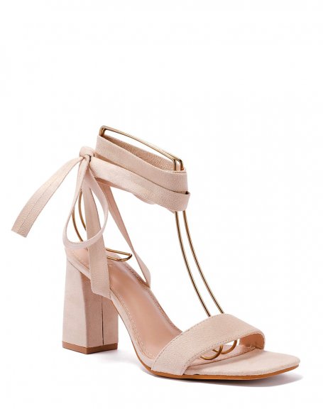 Beige sandals with thick strap and long heel laces