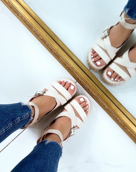 Beige sandals with thick straps and notched sole