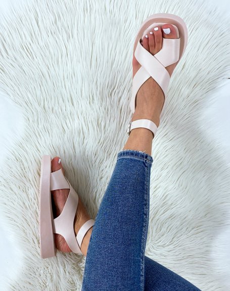 Beige sandals with wide crisscrossing straps