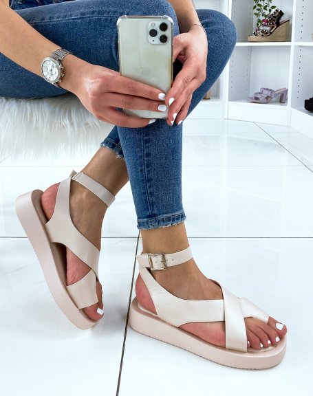 Beige sandals with wide crisscrossing straps
