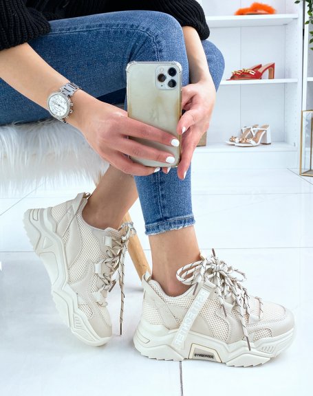 Beige sneakers with chunky sole and black details