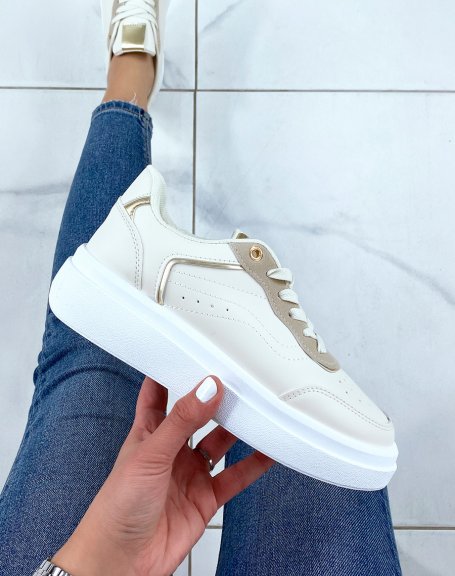 Beige sneakers with gold piping and thick white sole