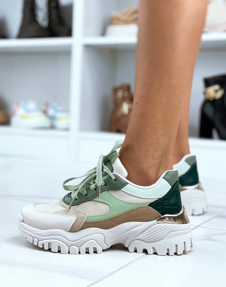 Beige sneakers with green inserts